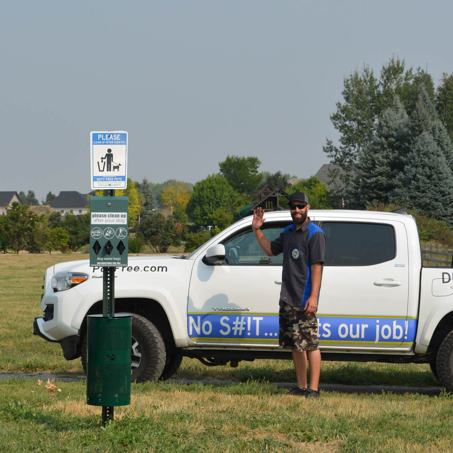 Efficient Duty Free Pets employee diligently clearing dog waste in scenic Johnstown, Colorado, ensuring a cleaner environment for all one pooper scooper service ata time